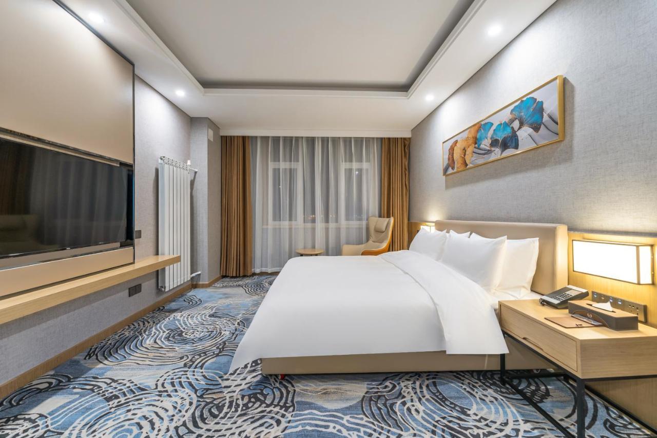 Joy Fall Hotel Jiaozhou Bagian luar foto