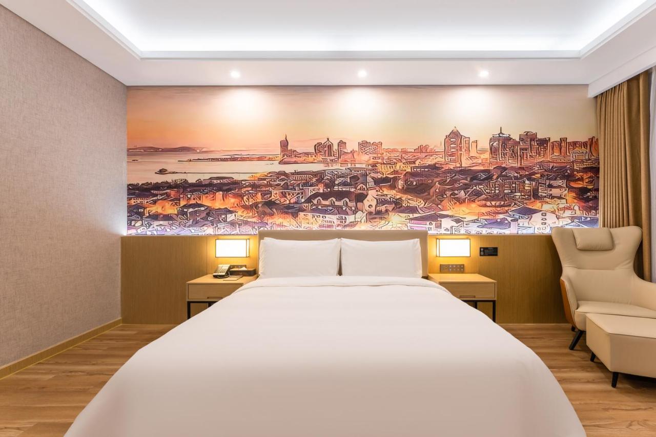 Joy Fall Hotel Jiaozhou Bagian luar foto